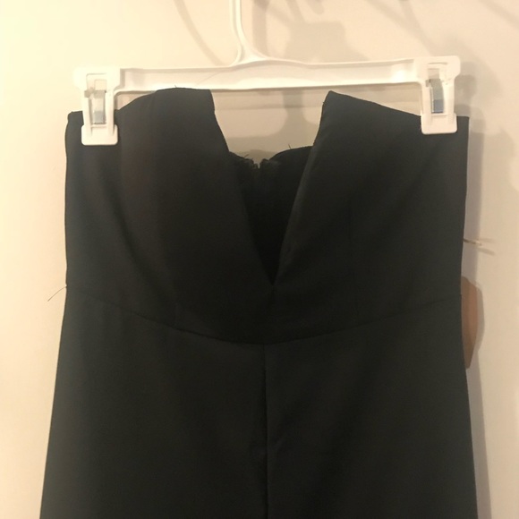 Dresses & Skirts - Plunging black jumpsuit!